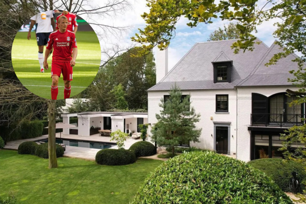Exterieur van de witte landgoedvilla van Dirk Kuijt in Noordwijk met een riante tuin.