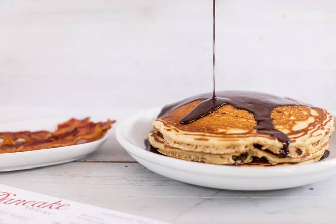 Pancakes drizzled with chocolate at Pancake Social
