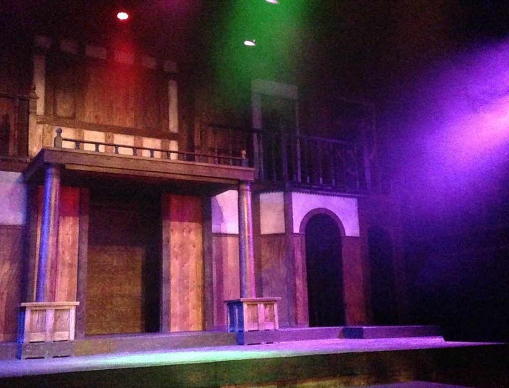 image of the stage at ASC with colorful lights
