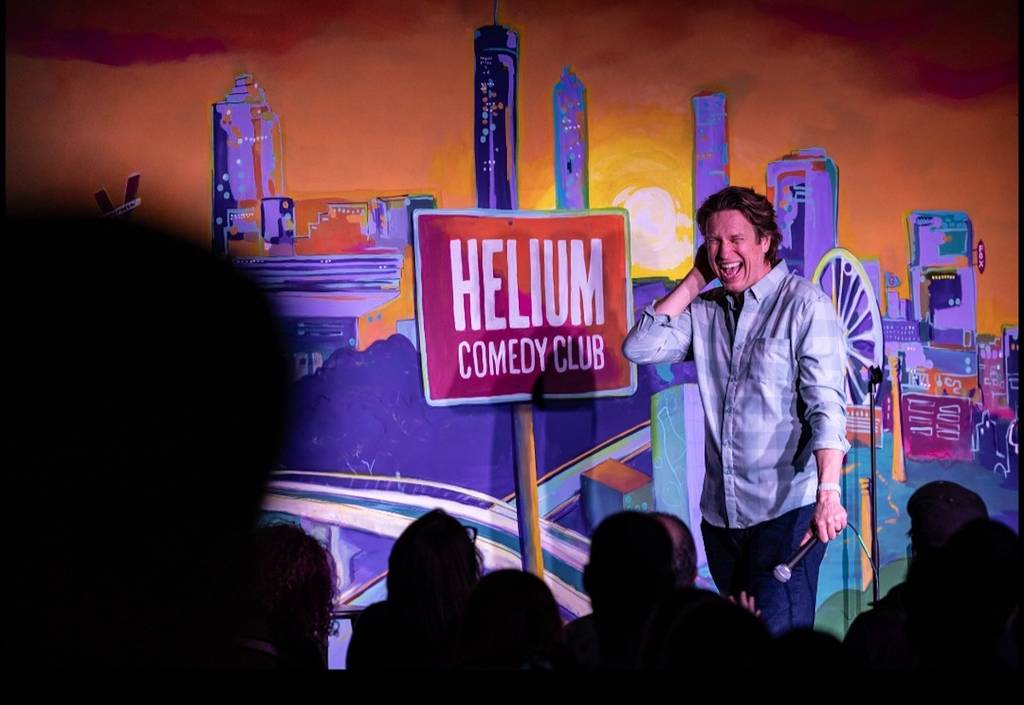 Pete Holmes on stage at the Helium Comedy Club