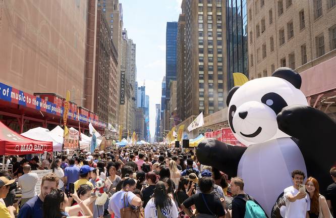 massive Asian food market outside with a panda inflatable