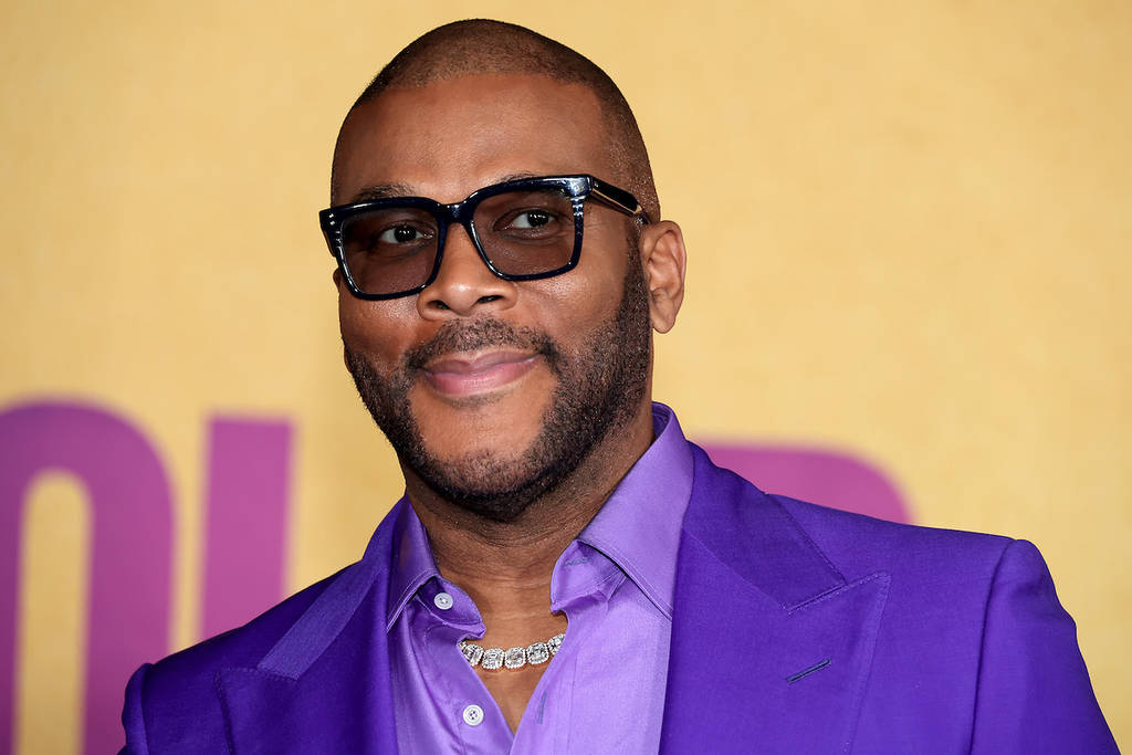 LOS ANGELES, CALIFORNIA - DECEMBER 06: (L-R) Tyler Perry attends the World Premiere of Warner Bros.'