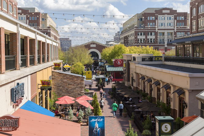 ATLANTA, GEORGIA/USA - OCTOBER 11, 2014: Unidentified people visit shopping mall at Atlantic Station. Atlantic Station is a neighborhood and shopping complex on the northwestern edge of Midtown.