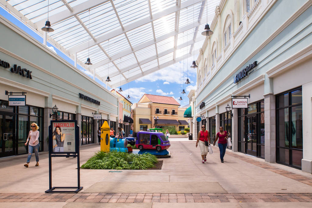 DEER PARK, NY - JULY 22, 2015: View of Tanger Factory Outlet outdoor shopping mall on Long Island, NY