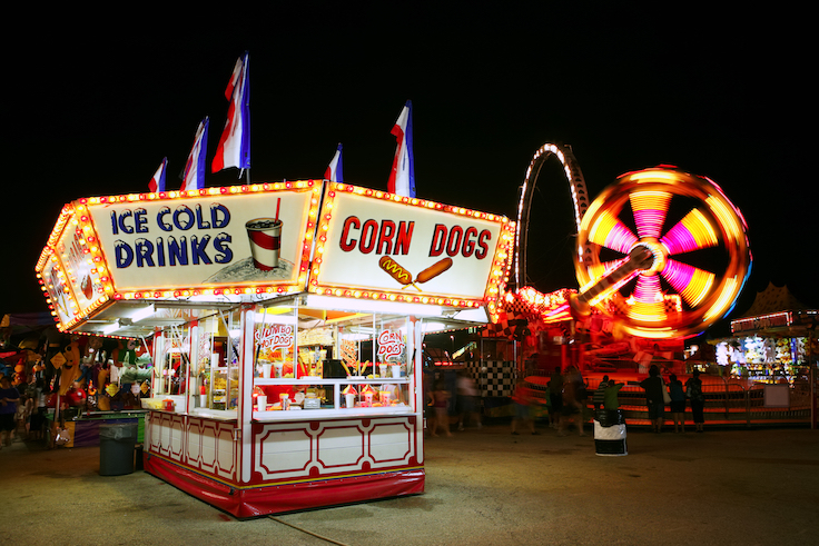 Food stand at a carnival at night