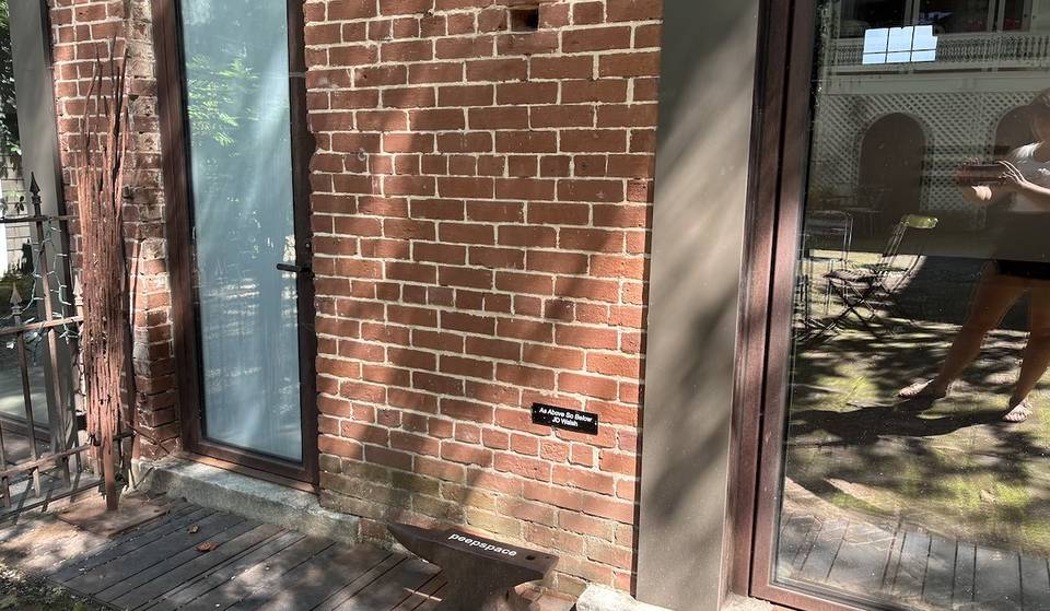 There’s A Hidden Brick Wall In Atlanta & You Can Peer Through It To See A Colorful Animation — Here’s How To Find It