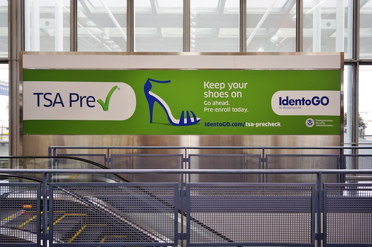 CHICAGO, IL -5 JAN 2017- Sign encouraging passengers to register for the time-saving TSA Prec Check program in the United Airlines (UA) terminal at the Chicago O'Hare International Airport (ORD).