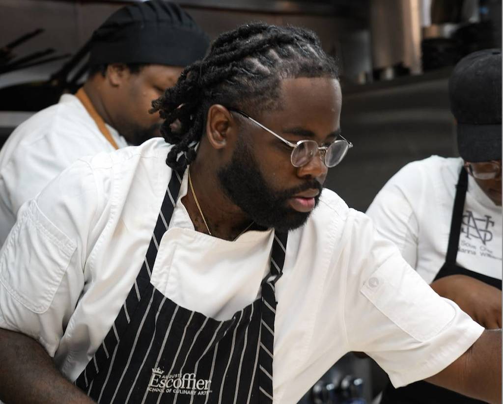 an African-American chef making food