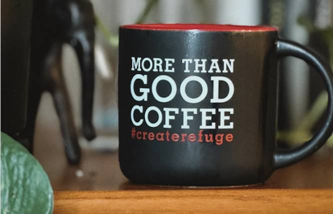 a coffee cup that says "more than just good coffee"