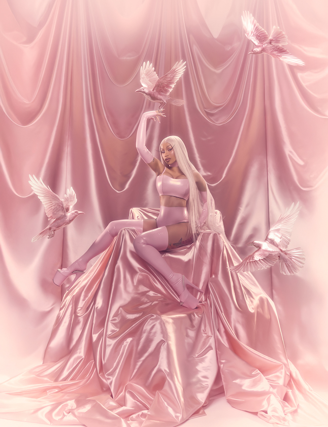 cardi b in all pink with pink satin around her