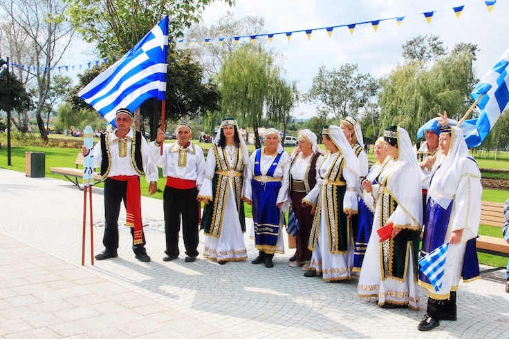 MARIUPOL, UKRAINE-SEPT 25: The participants of Greek community Ethnic Festival Mega Yorty in Greek National costume September 25, 2021 in Mariupol,Ukraine