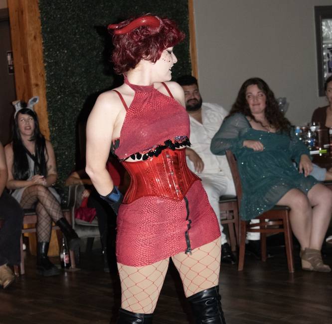 woman dressed in a sexy version of Dragon from Shrek