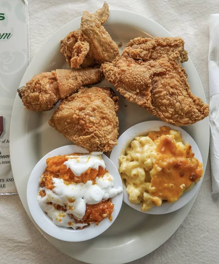 a southern style dinner with chicken and Mac and cheese