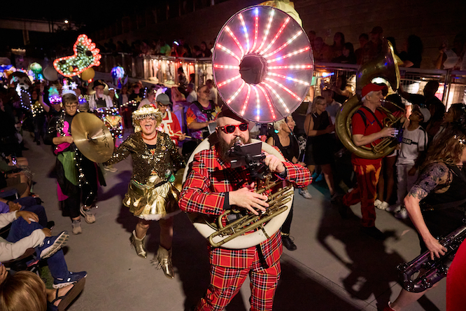 a man playing a tuba