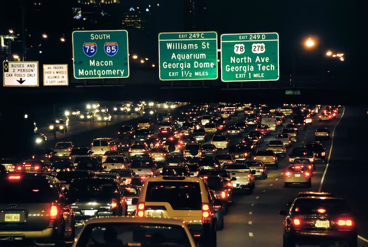 Rush hour traffic at night in Atlanta Georgia GA USA. Created 08.10.22