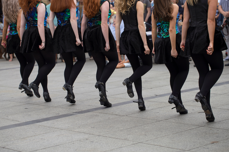 Irish dancers are dancing
