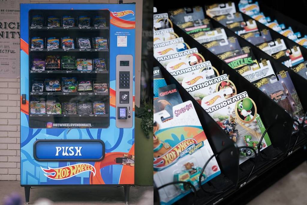 a hot wheels cars vending machine in a coutyard