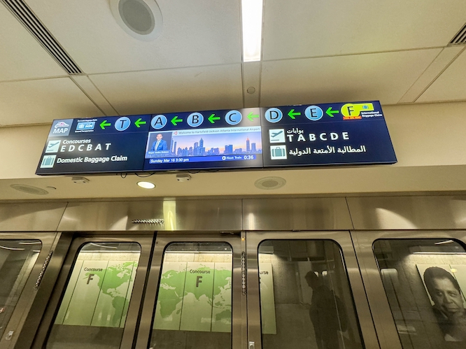 Atlanta, GA USA - March 16, 2025:: The sign for the gate train at the Hartsfield Airport in Atlanta, GA USA.