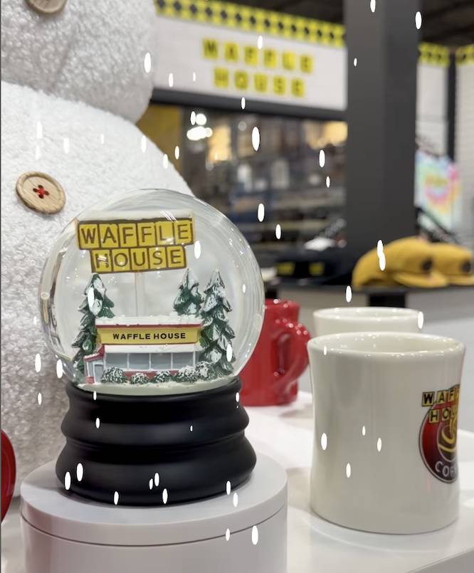 A Waffle House themed snow globe
