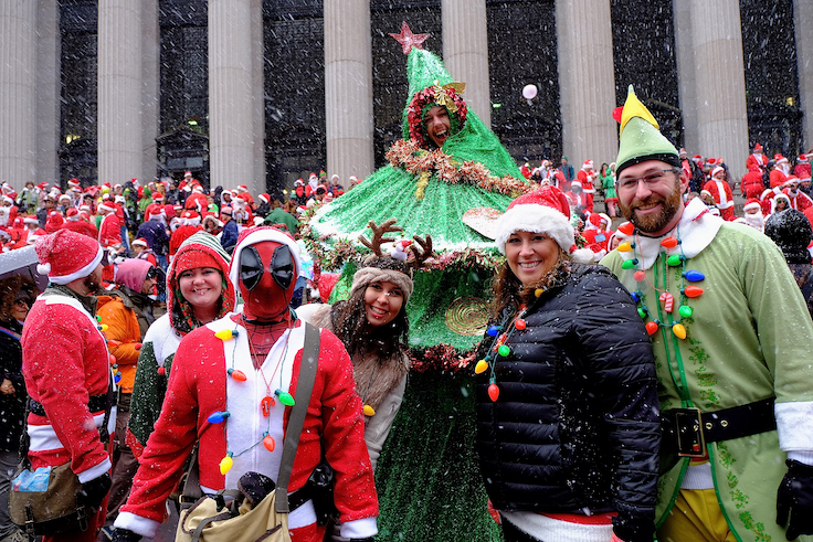 NEW YORK, NY--DECEMBER 9, 2017: Participants in the annual pub crawl known as Santacon on the streets of Manhattan. The event has been criticized for rowdy behavior and drunkenness.