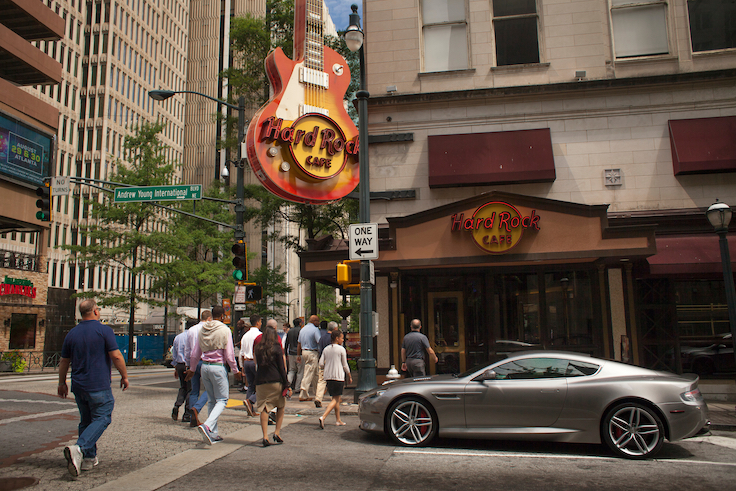 Atlanta, Georgia, USA – July 30, 2015: Horizontal shot of the pedestrian crossing at Andrew Young International Blvd with Peachtree St in front of the Hard Rock Cafe entrance, Downtown