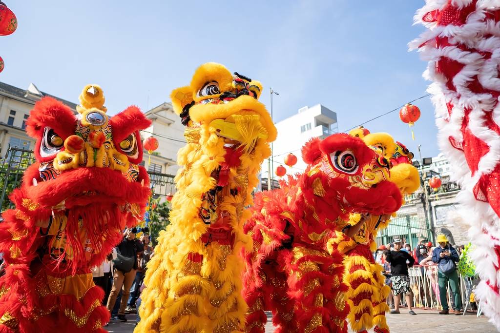 Ho Chi Minh city, Vietnam - 21 Jan 2023: Dragon and lion dance show in chinese new year festival (Tet festival ), lion Dance - dragon and lion dance street performances in Vietnam