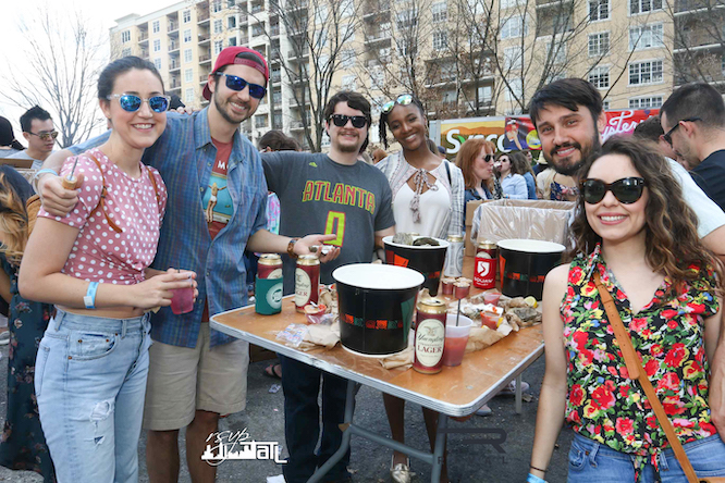 a group of people enjoying oysters
