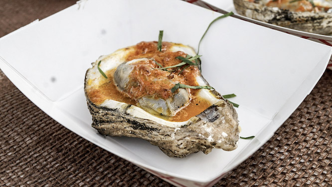 a loaded oyster on a plate