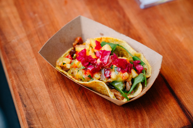 a taco in a to-go container