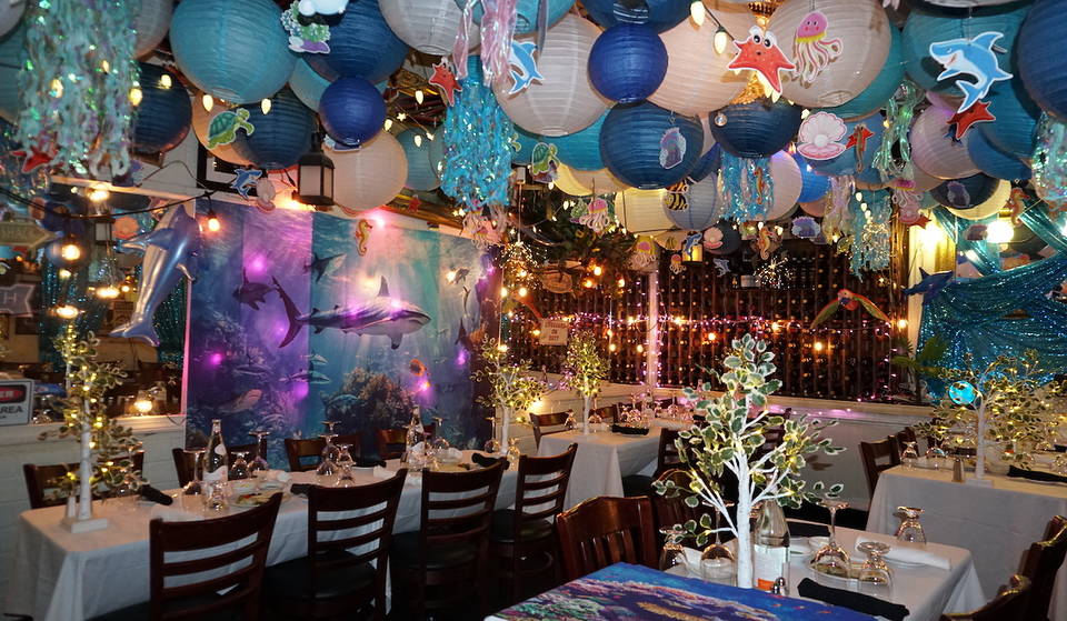 This Whimsical Italian Restaurant Is Transforming Into A Retro-Inspired ‘Under the Sea’ Escape — Dive Into A Summer Of Floating Jellyfish, Cheeky Sharks, &amp; Seaside Nostalgia