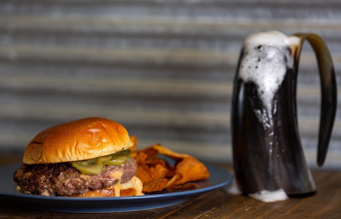 burger with a beer in an animal horn