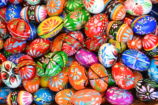 KRAKOW, POLAND - MARCH 29, 2015: Painted eggs 'pisanki' on Easter market. The annual Easter Fair in the Market Square is a popular tourist attraction