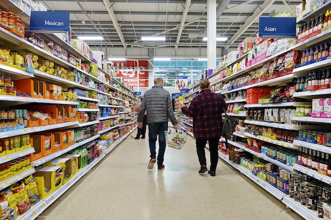 Shoppers browse an aisle in a Tesco supermarket on April 4, 2019 in London, UK. Britain's Tesco is the world's 3rd largest supermarket retailer after America's Walmart and France's Carrefour.