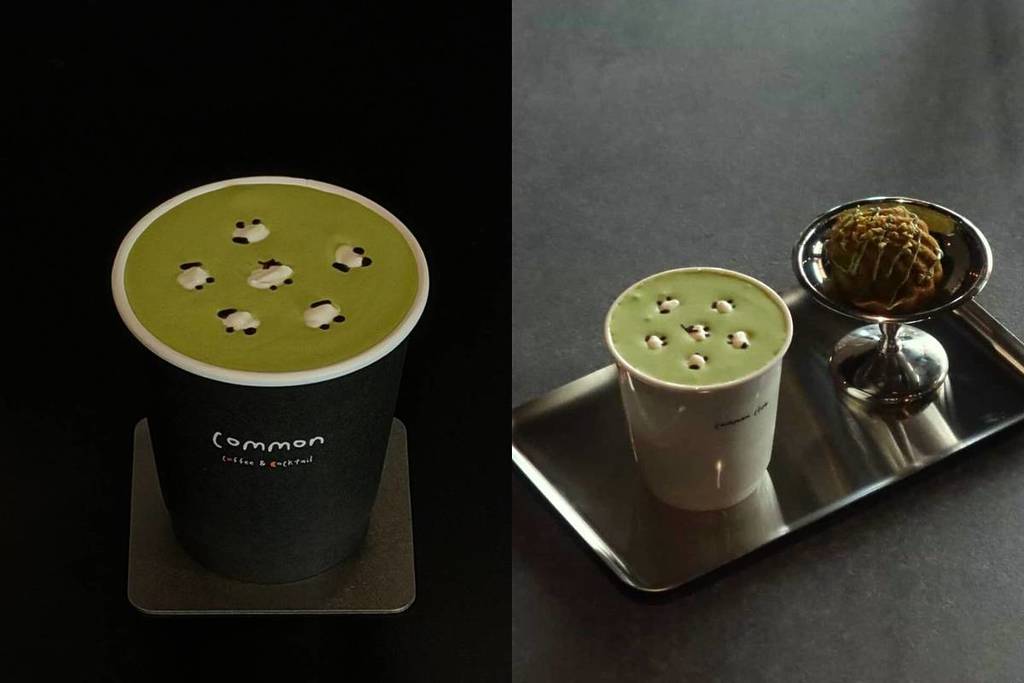 a green matcha latte with little sheep drawn in