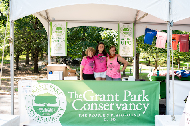 women standing at a table canvasing for Grant Park Conservatory