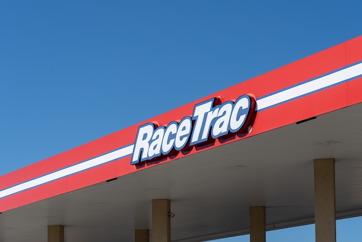 Naples, FL, USA - December 31, 2021: A RaceTrac gas station sign is shown in Houston, Texas, USA. RaceTrac, Inc. is an American corporation that operates a chain of gasoline service stations.