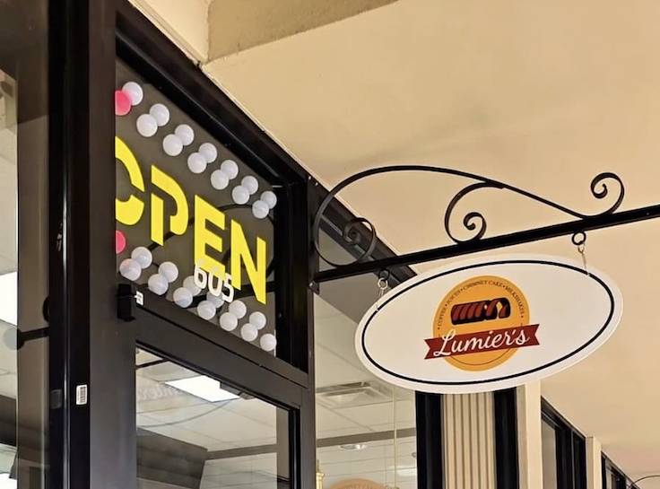 open sign on a dessert shop