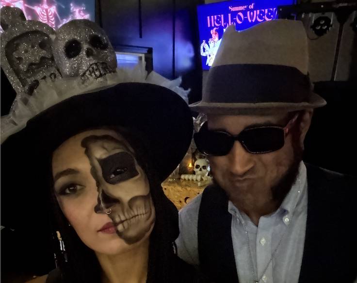 a couple in a halloween costume