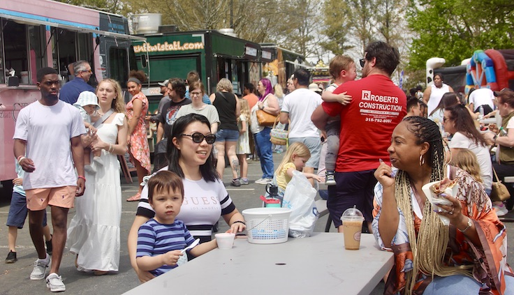 people eating at a festival