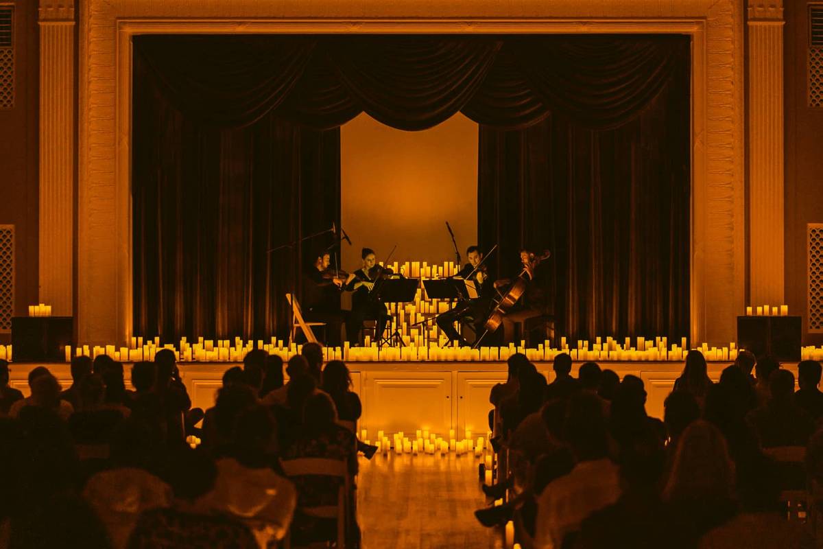 A string quartet performing at a Candlelight concert at The Mansion in Austin