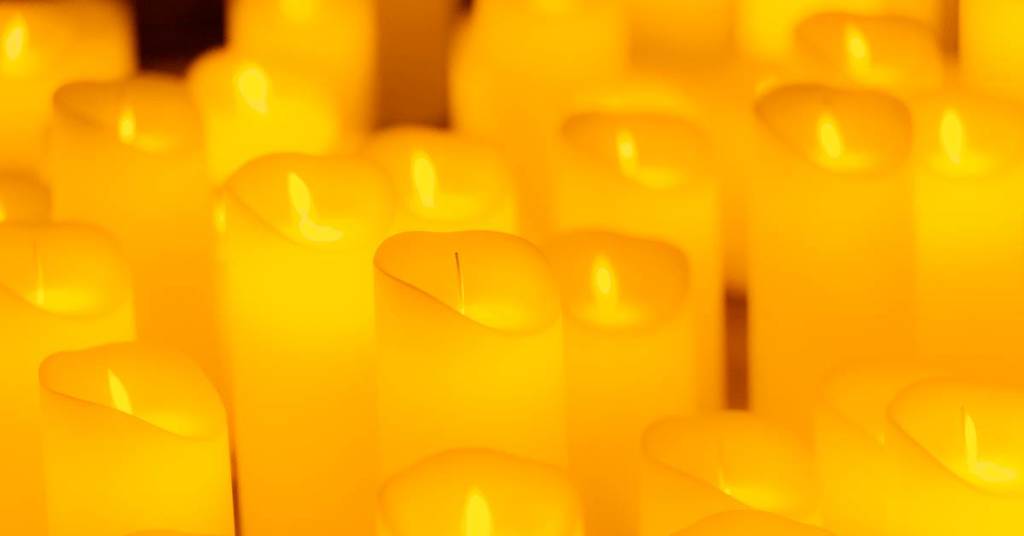 Close up of a sea of candles