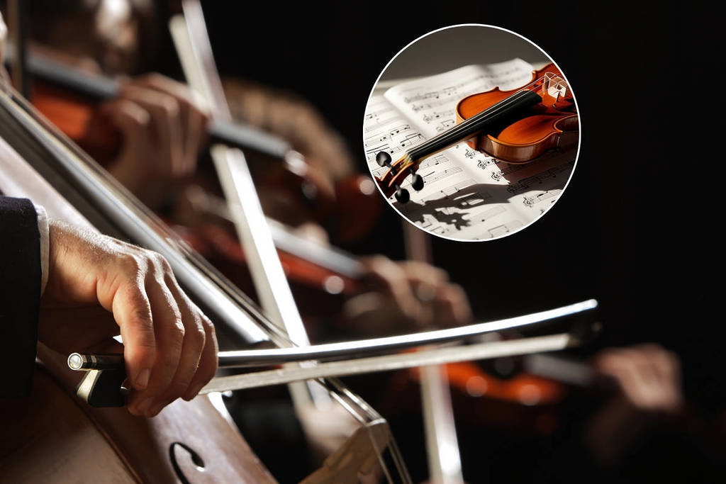 String quartet playing classical music, close-up of sheet music and instruments