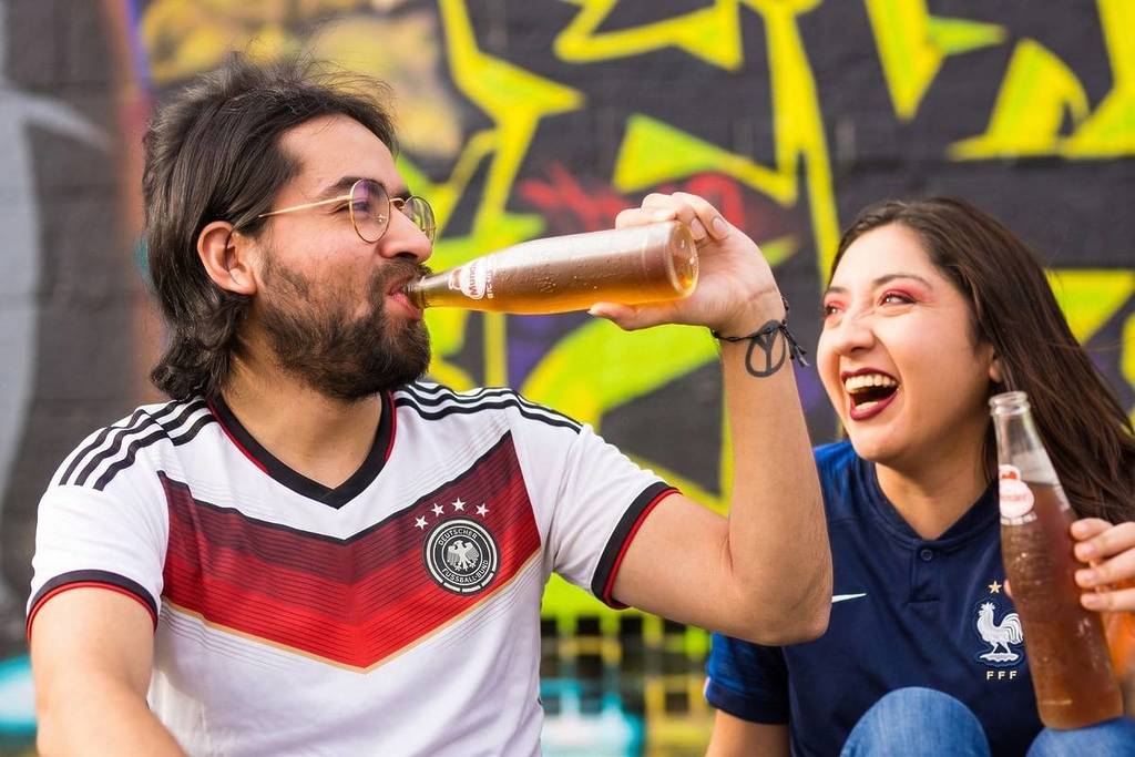 Fans enjoy drinks during public viewing for the 2026 World Cup