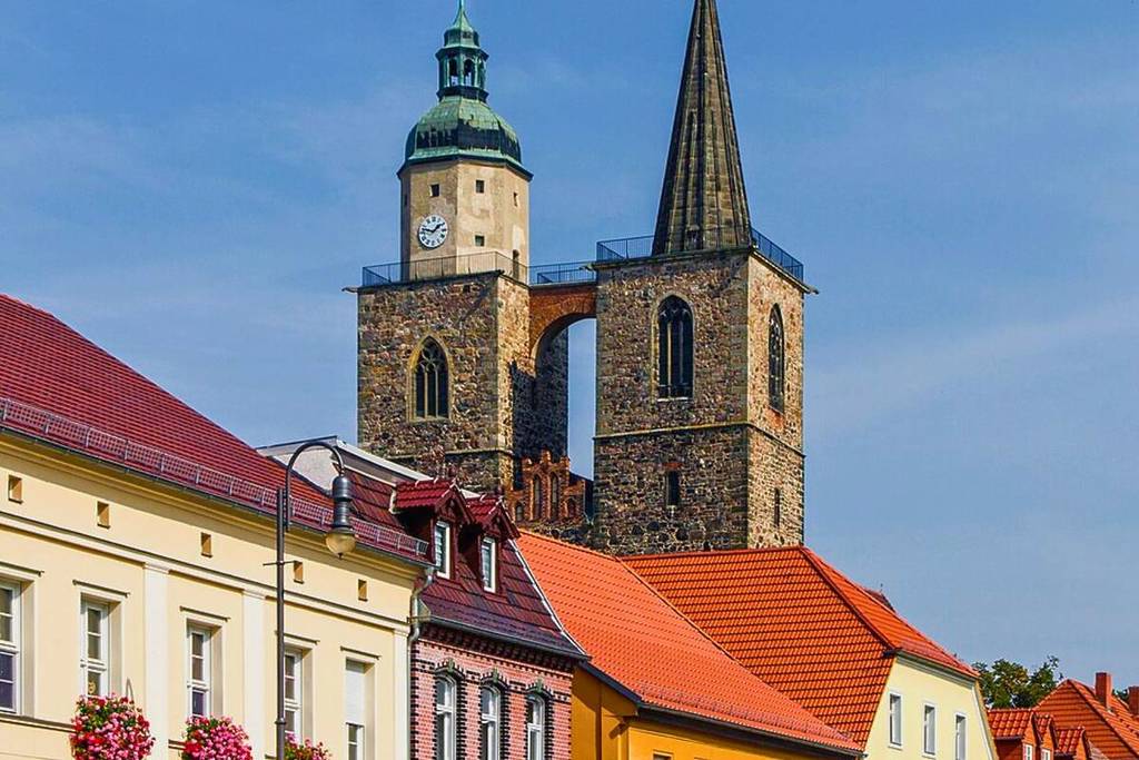 In the heart of Brandenburg, 70-meter-high asymmetrical church towers rise into the sky.