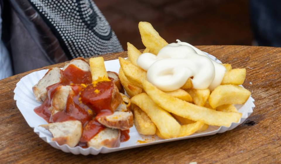 With or without fries, mild or spicy? Here are our top 10 currywurst spots in Berlin!