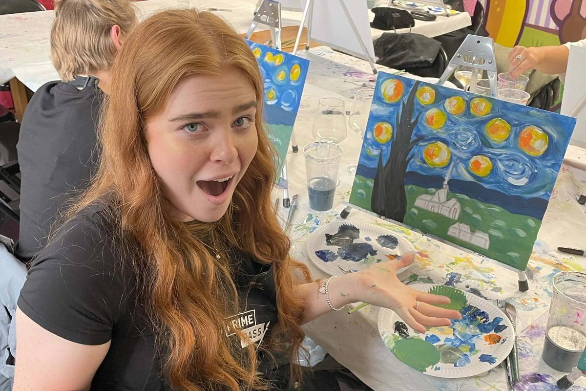 A woman at a painting workshop