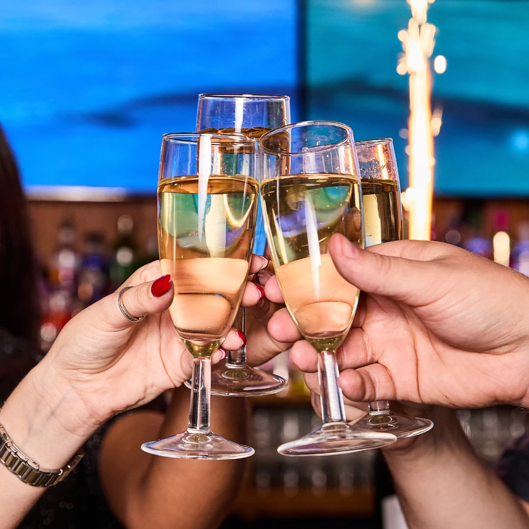 Champagne flutes cheersing
