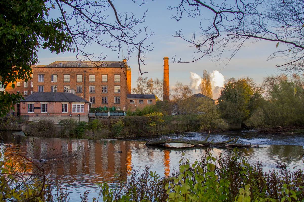 Beautiful Architecture of the Darley Abbey Mills with stunning Derwent river view in Derby, UK