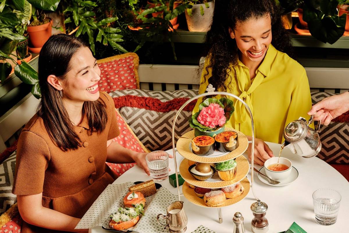 Two women eating at The Ivy in Birmingham