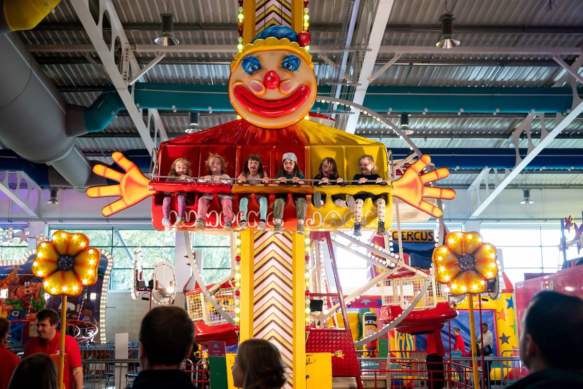Children on a ride at the Indoor Funfair
